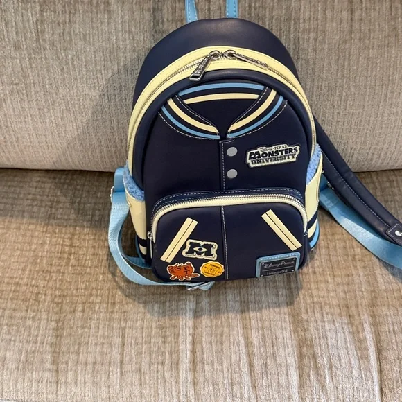 Disney Monsters University varsity jacket Navy and Cream Backpack 10 x 8 - Picture 8 of 10